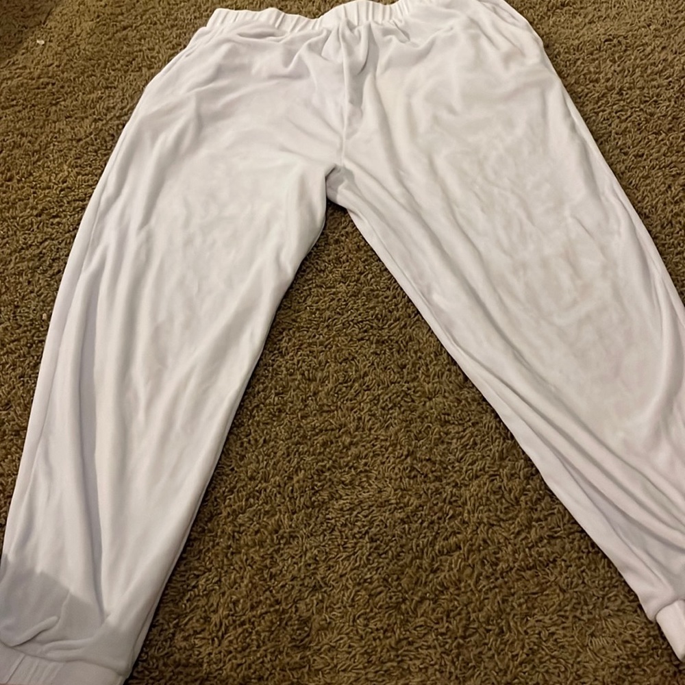 Fluffy pants  2 separate  pants one white one olive each 15 dollars